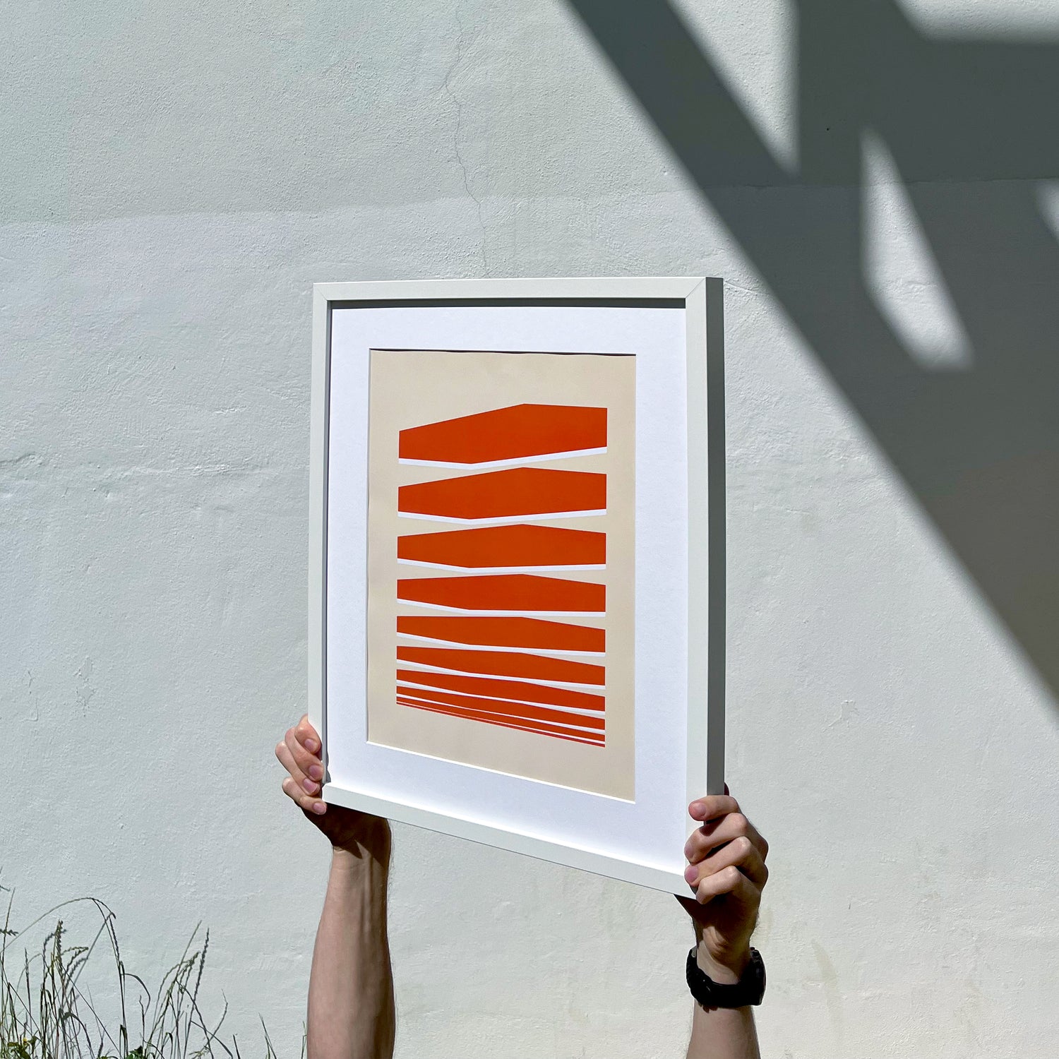 Digital printing poster Povetrie in a white frame in hands