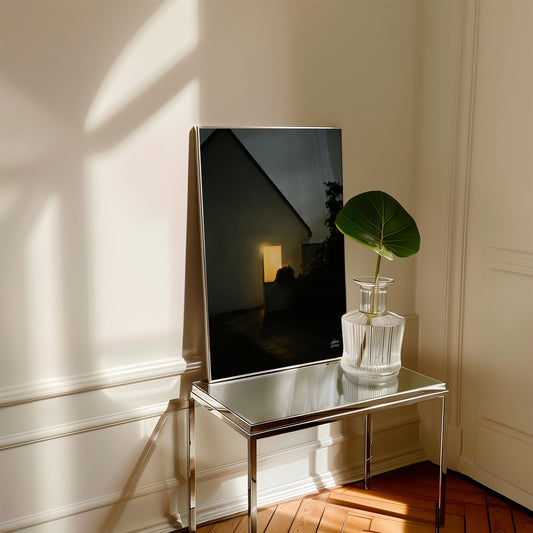 dark fine art photography on the small table with a mirror and a vase with a leaf in a room
