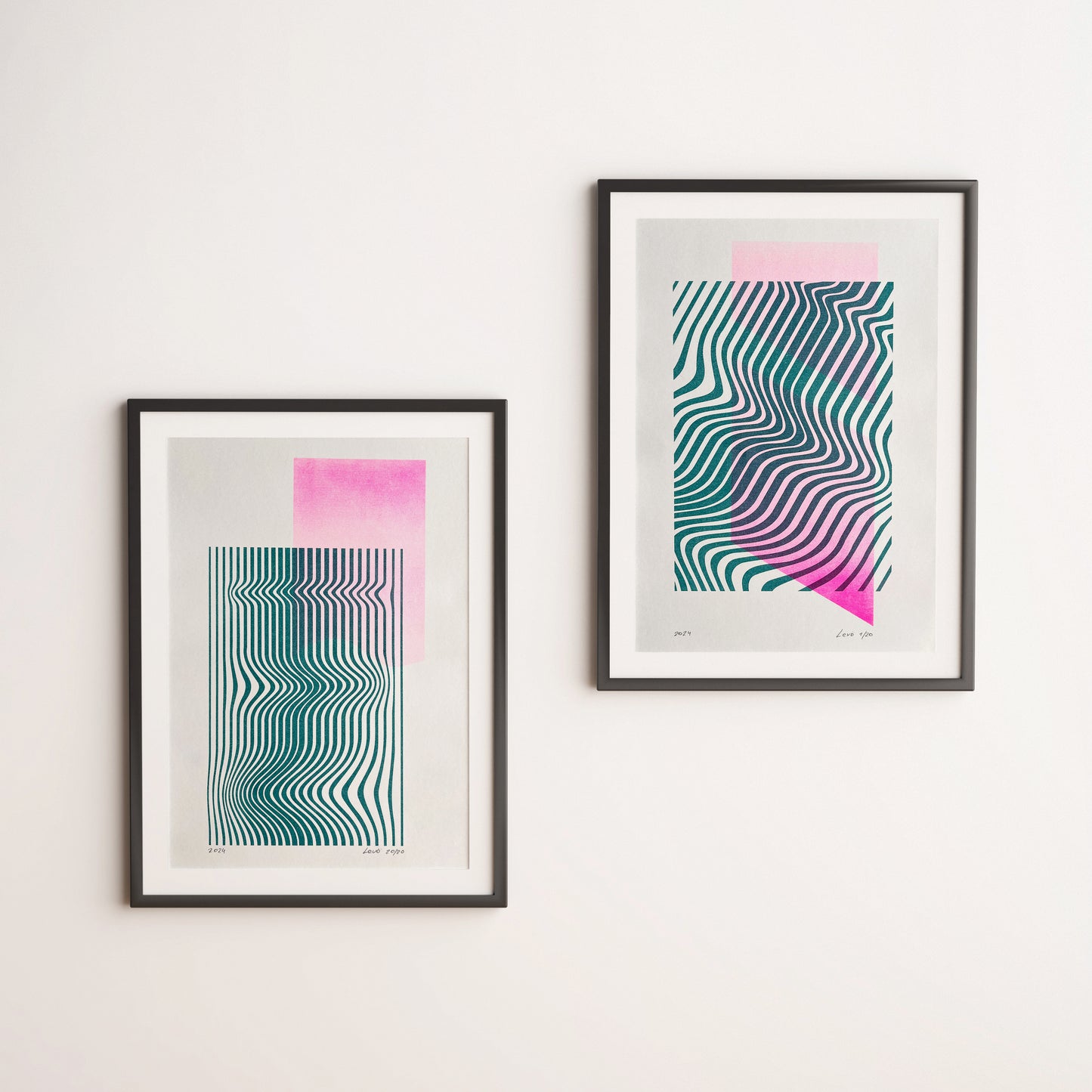 Limited edition risograph posters Volna in pink and teal in black frames