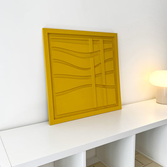 Levo yellow wall sculptural relief with wave lines with two vertical lines in a white living room