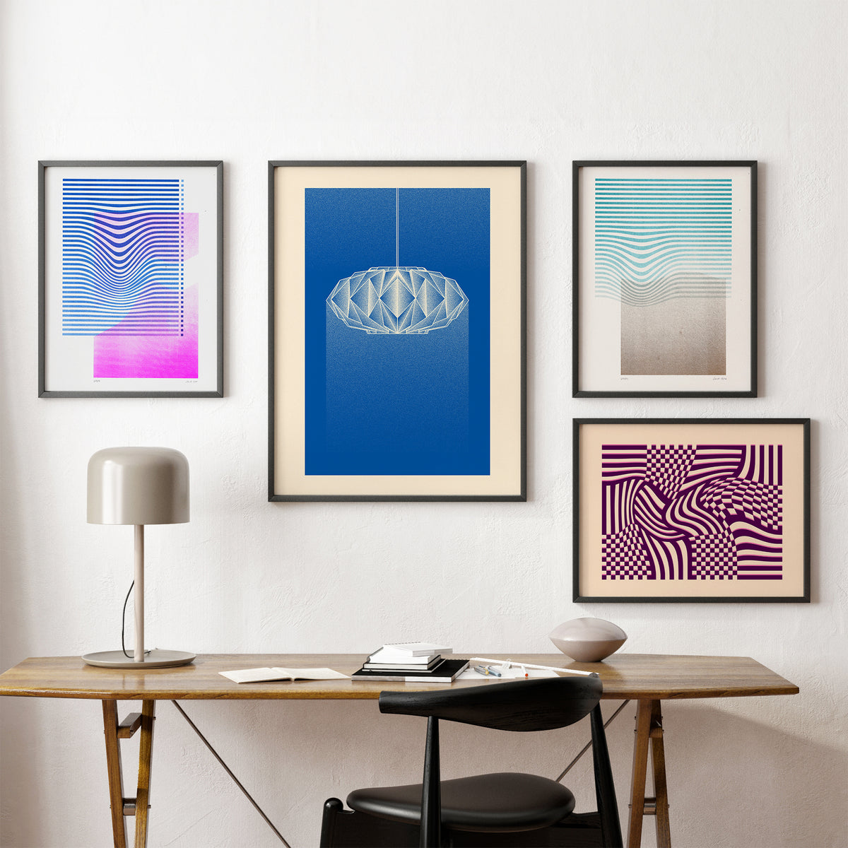 four posters on the white wall