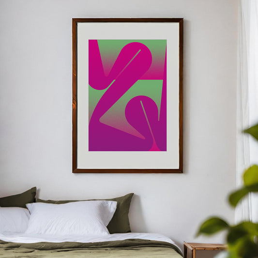 Interior print with curved line in green and pink in a black frame in a bedroom