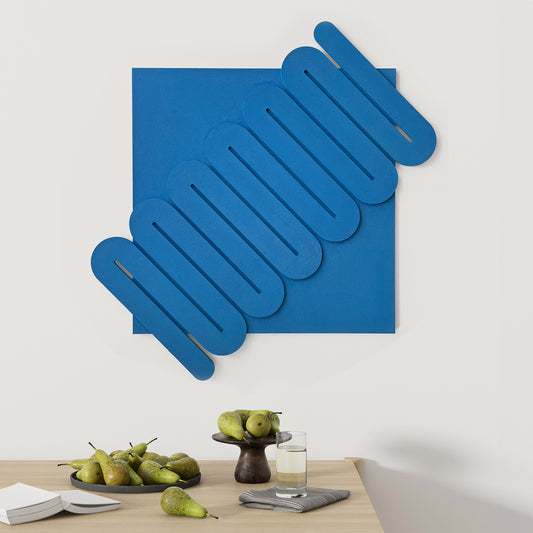 Wall relief Abstract Sculptural Painting in blue on the wall above table
