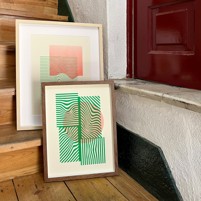 Limited edition two artwork prints in green and red in wood frame