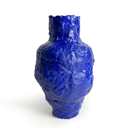 Blue textured vase on a white background by Anna De at Levö