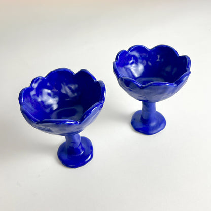 Two blue vases by Anna Demidova Levö  on a white background