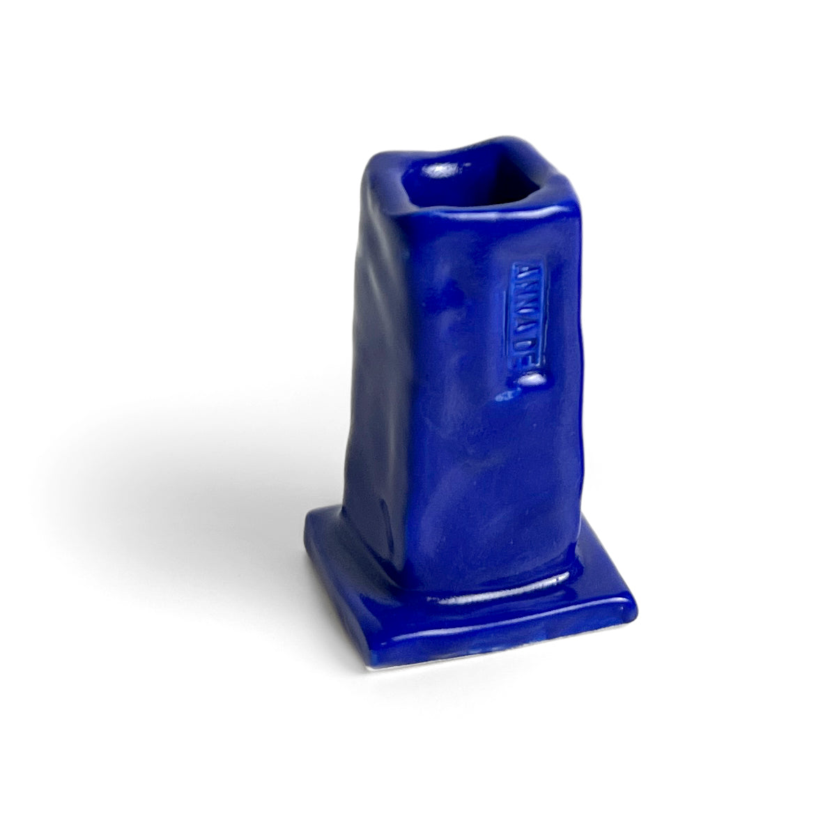 Blue ceramic Candlestick on a white background