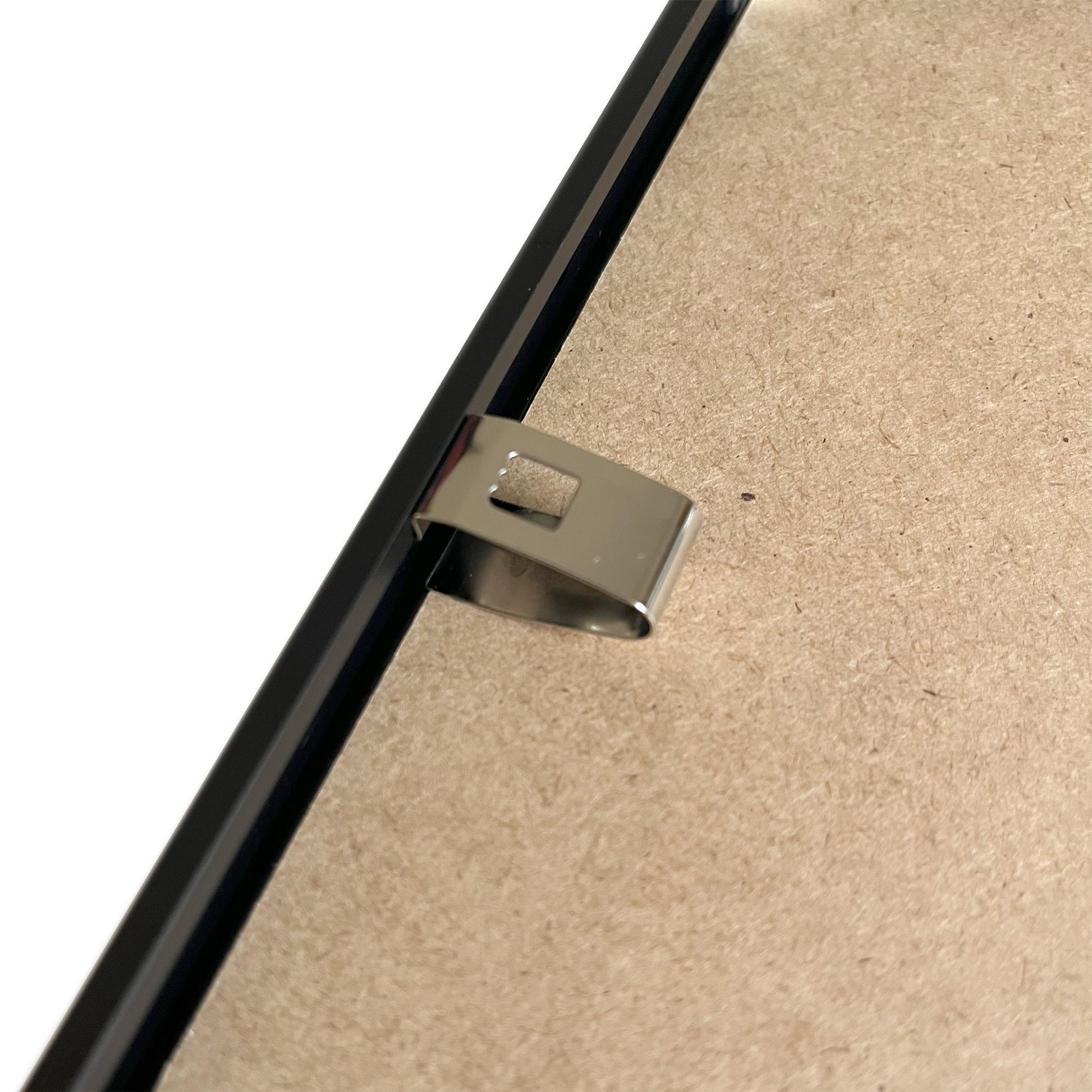 metal fasteners and black aluminum frame at the back