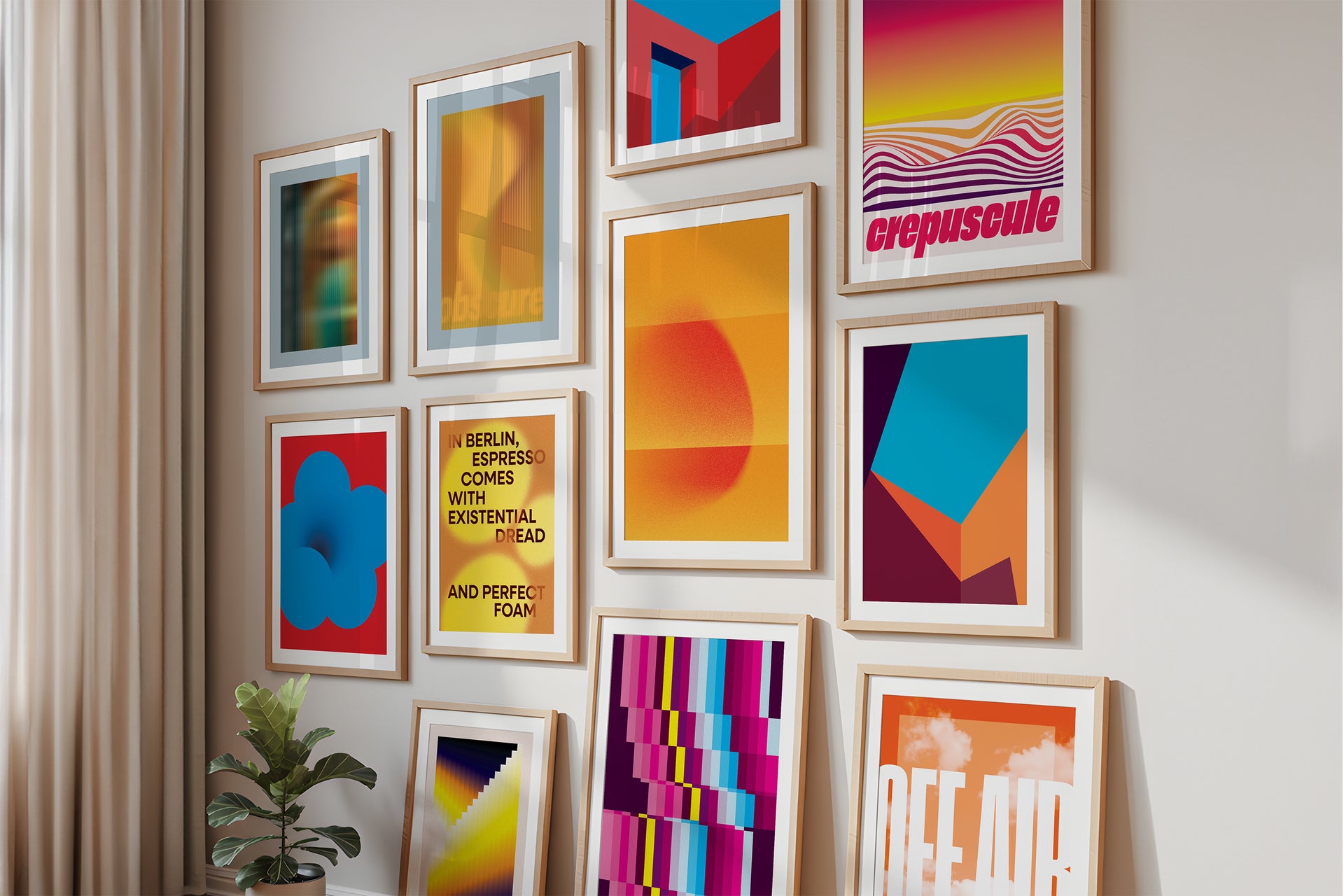 Collection of colorful framed artworks on a wall