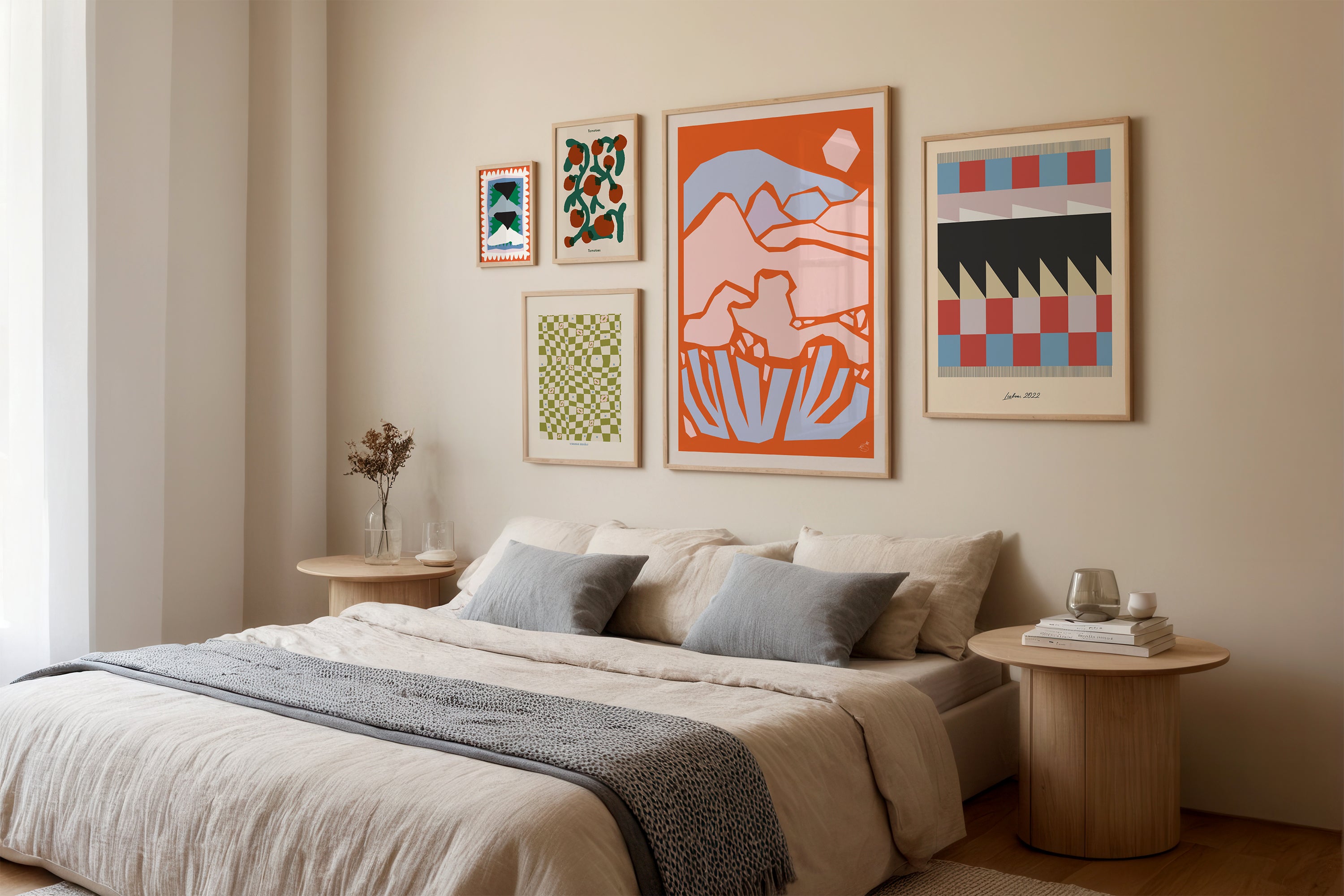 Bedroom with colorful wall art gallery by Emma Hall
