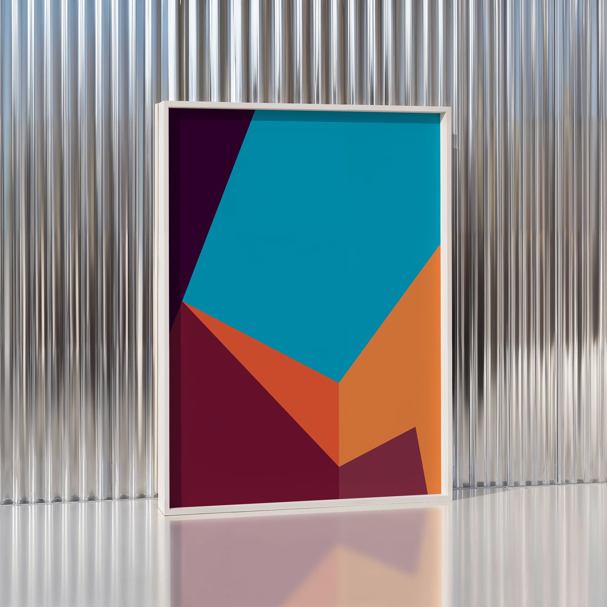 Framed abstract art with geometric shapes against a corrugated metal background