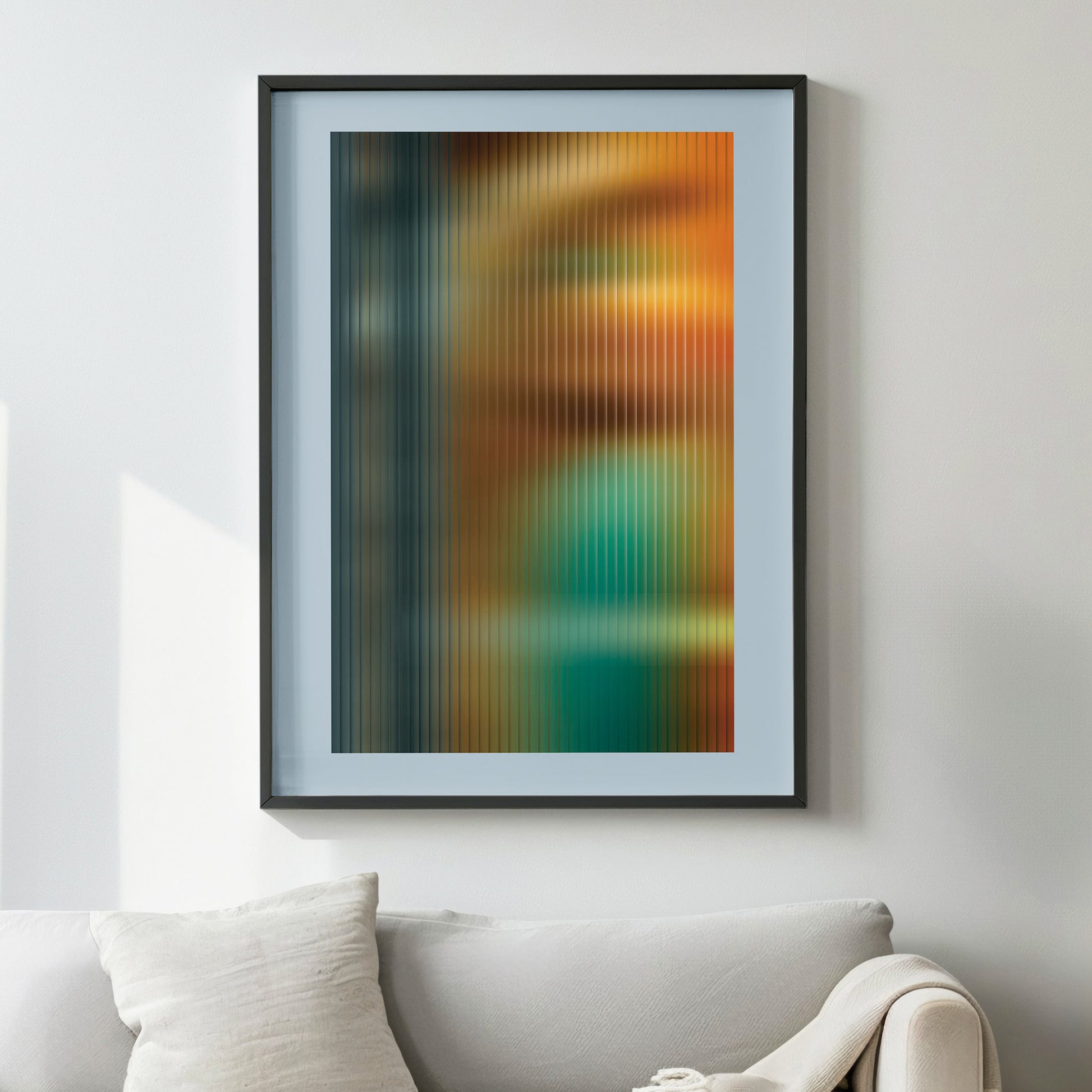 abstract interior poster in yellow-brown colors with ribbed glass effect in black frame in living room