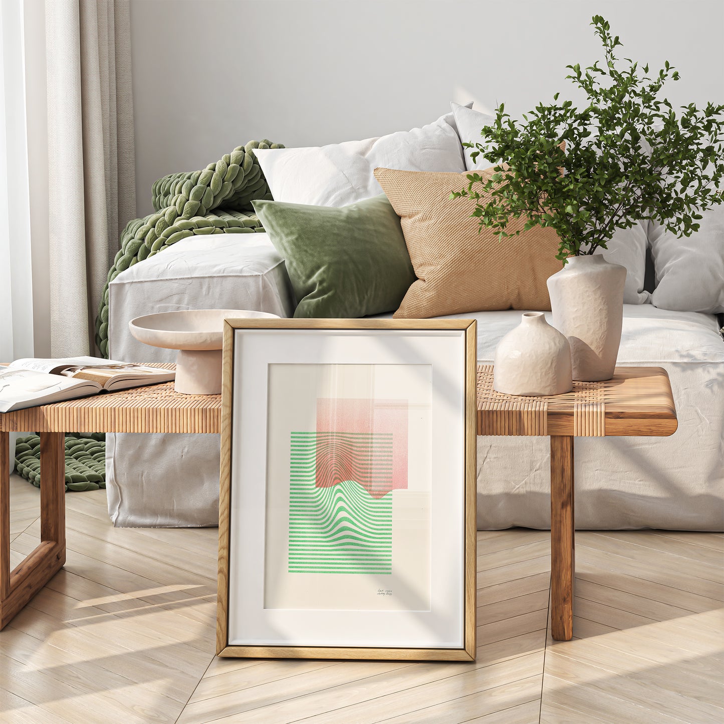 Limited edition poster Volna in green and red in a wooden frame in a white living room