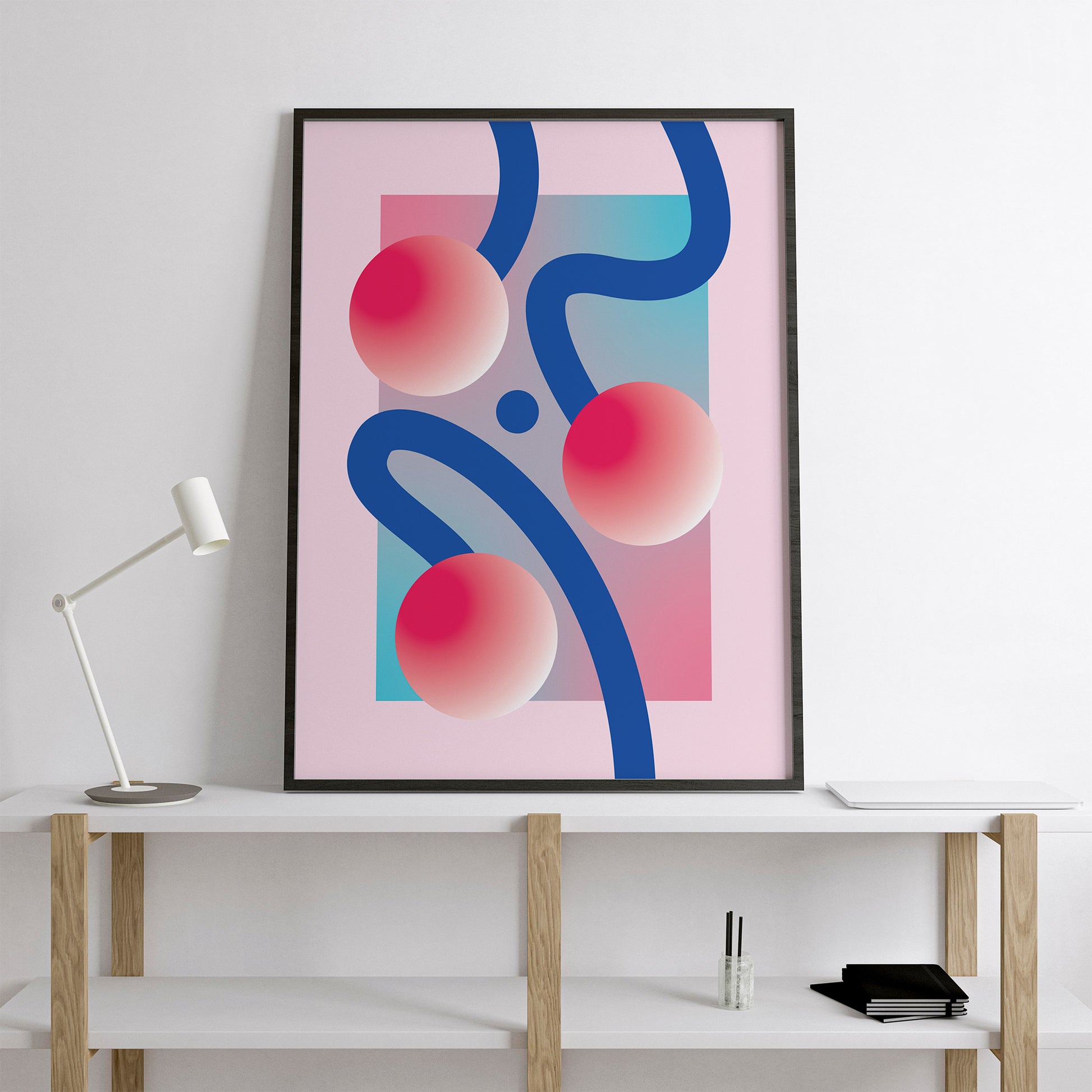 Jáhoda Poster with three circles and curved lines in a black frame on the shelf