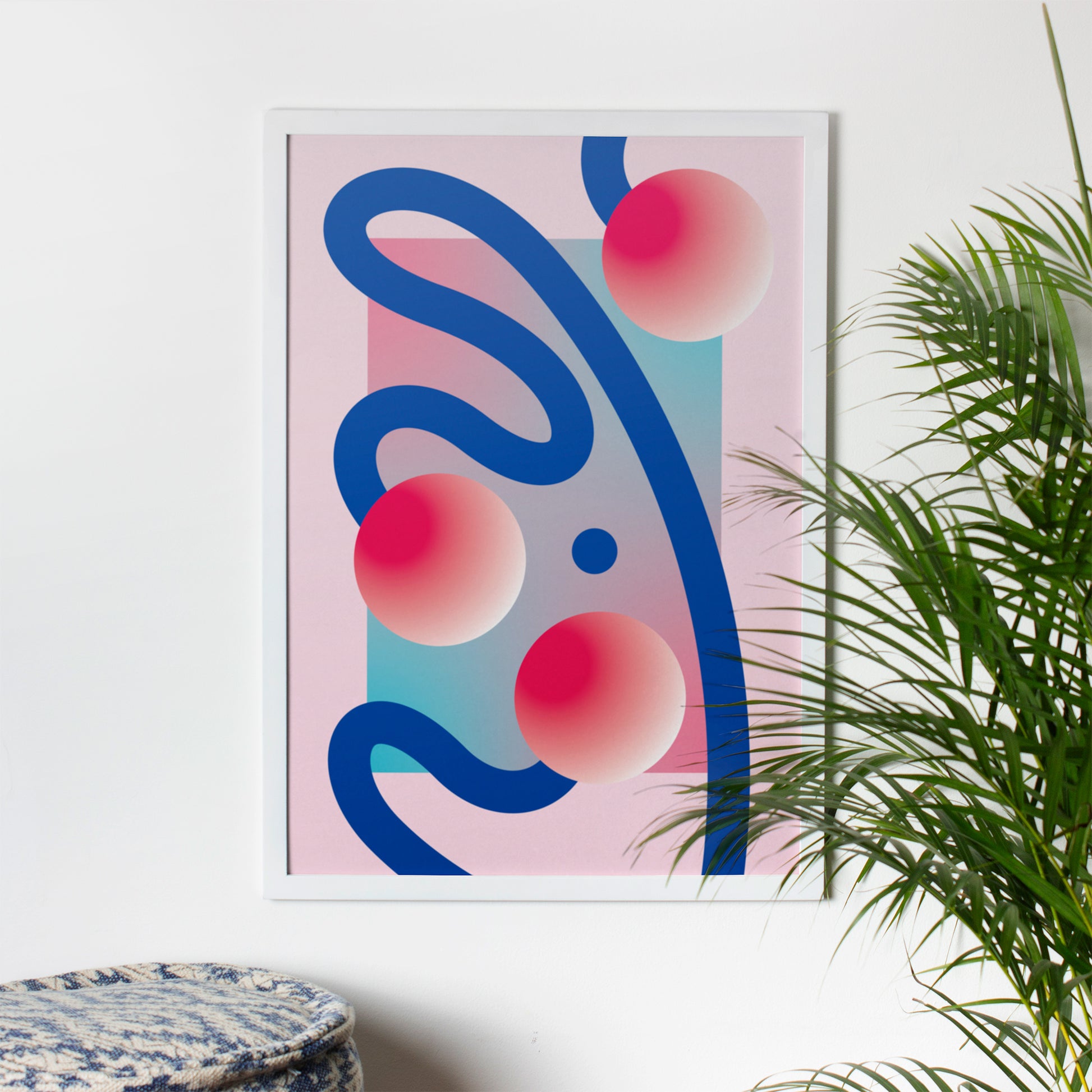 Jáhoda Poster with three circles and blue curved lines in a white frame on the wall