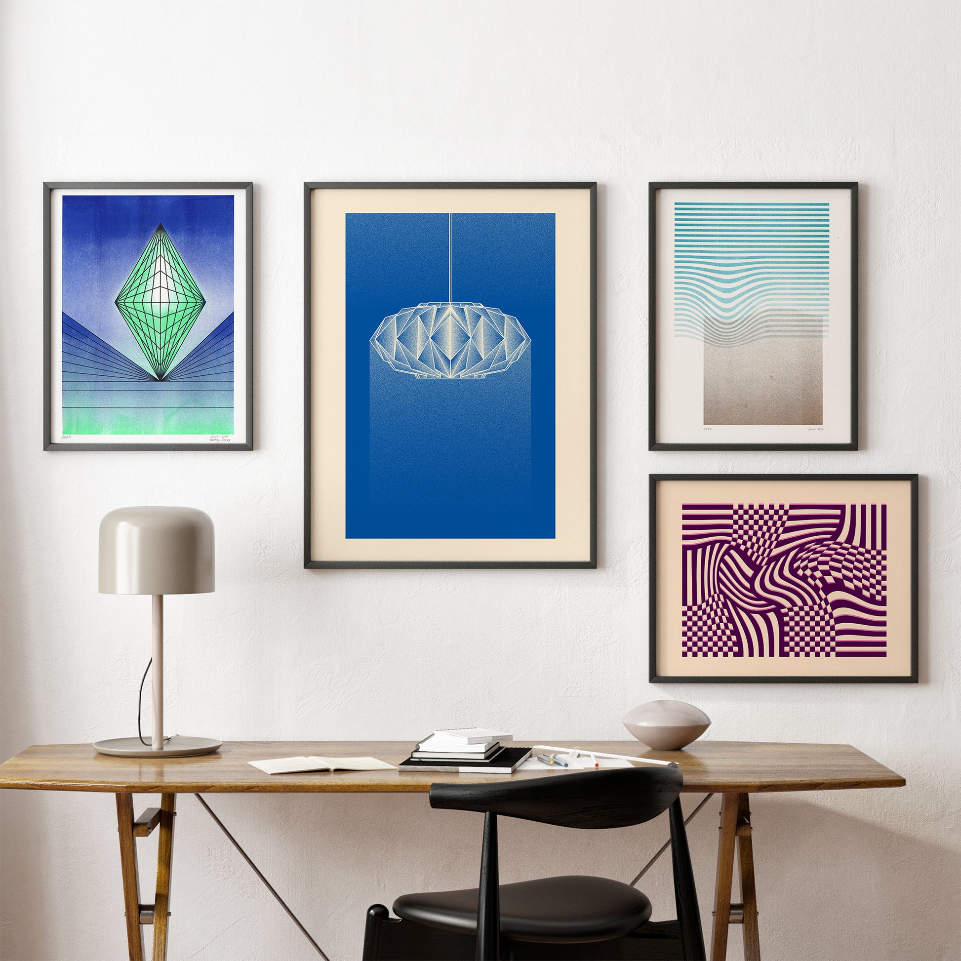 four posters on the white wall