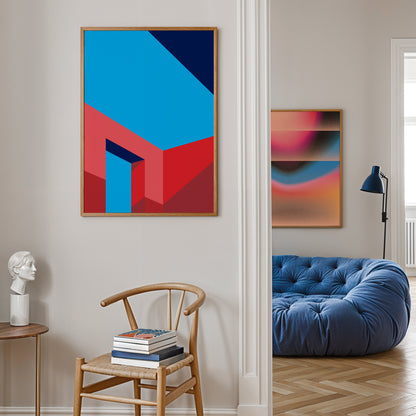 Modern interior with abstract art on the wall, a blue sofa, and wooden chair.