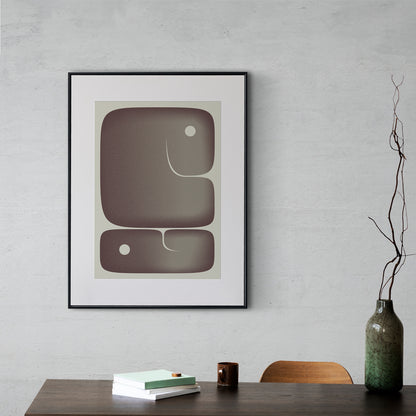 Digital Printing poster Akmon with a black frame behind a table with a vase