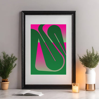 Interior print in with a curved line in green and pink in a black frame