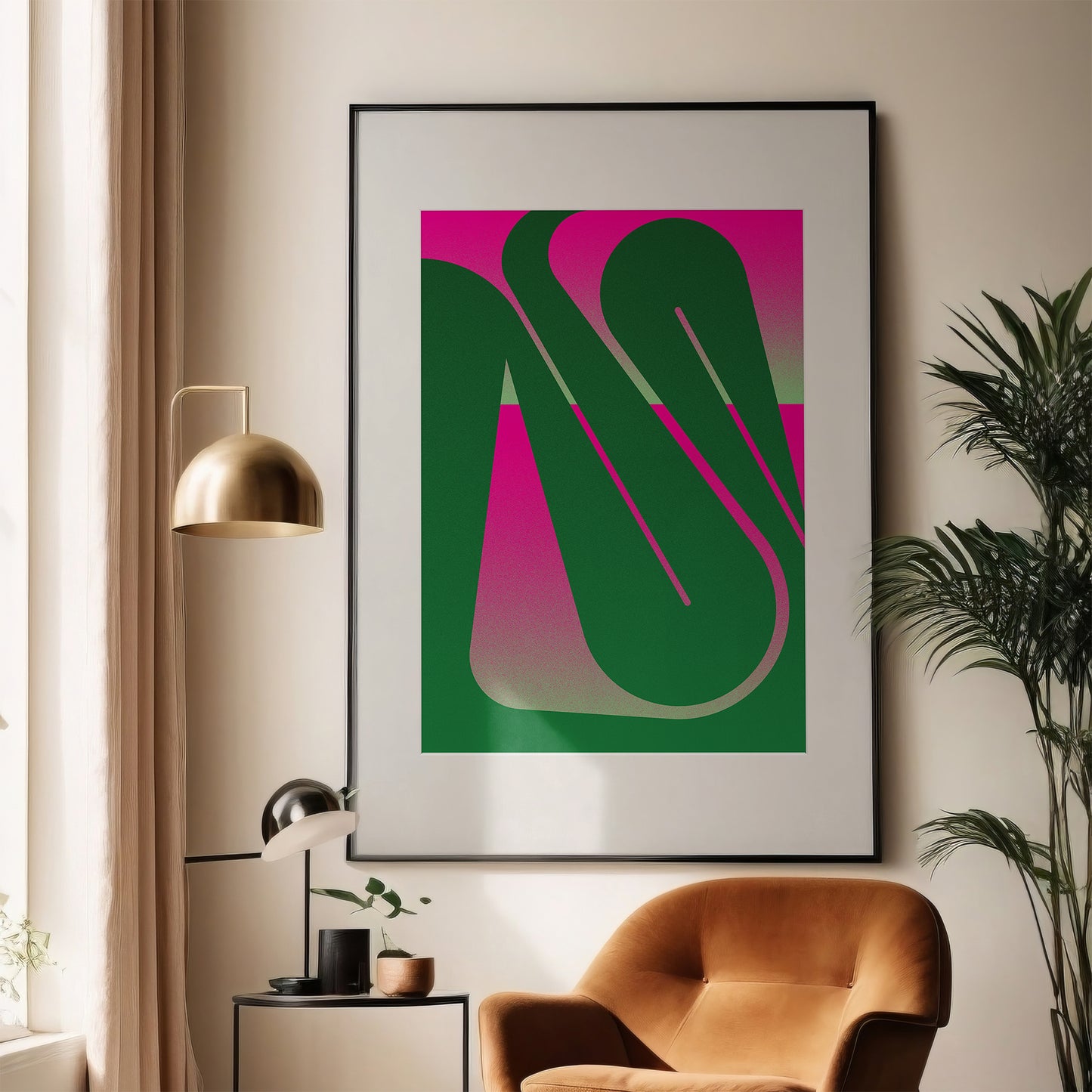 Interior print in with a curved line in green and pink in a black frame on the wall in a living room