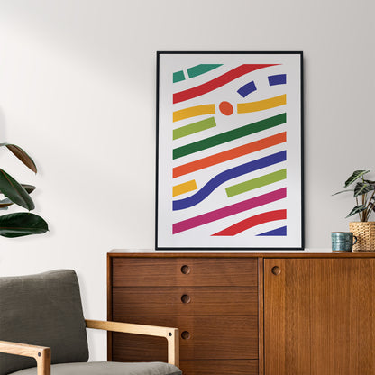 poster with colorful lines in a black frame in a living room