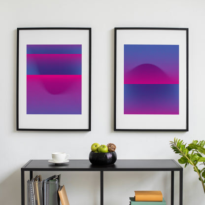 Two blue pink abstract interior prints in black frames