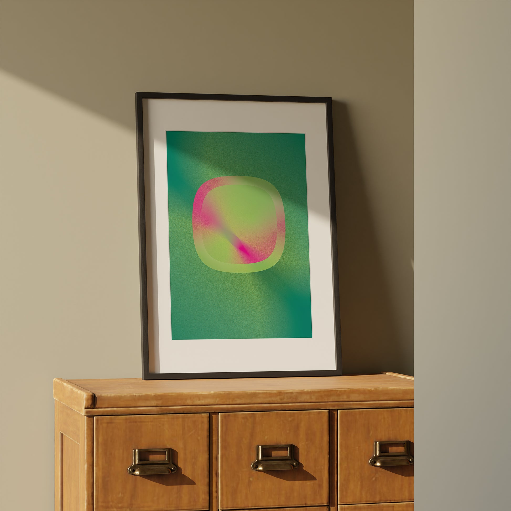 Green-pink interior poster with geometric shape in a black frame