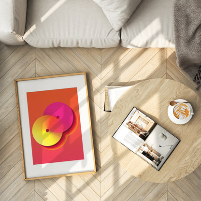 yellow-orange interior poster with geometric shape in a wooden frame in a living room